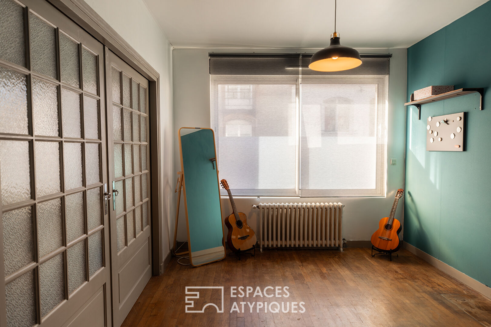 Esprit maison de ville : duplex atypique avec jardin partagé