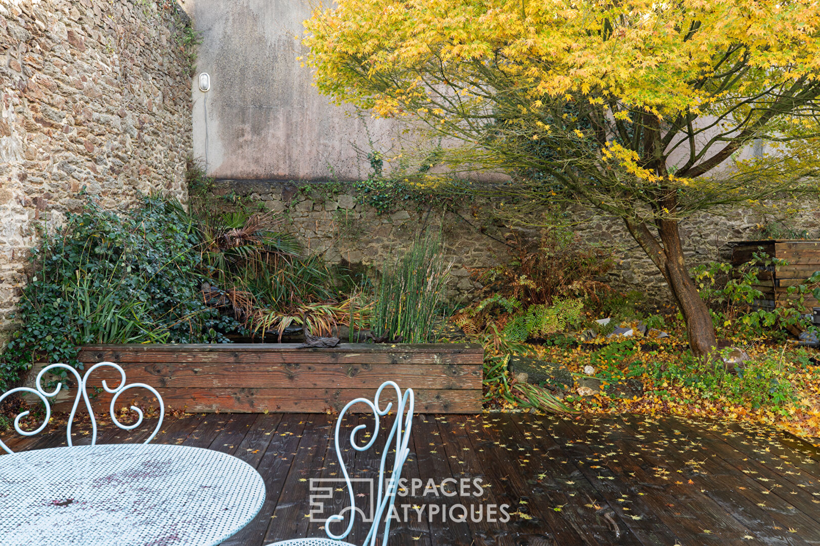 Esprit maison de ville : duplex atypique avec jardin partagé