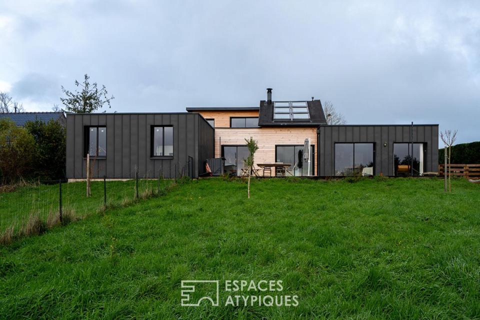 Maison contemporaine avec vue dégagée sur la rivière et la vallée