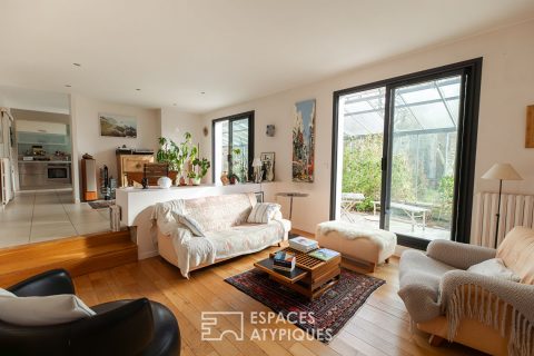 Maison familiale avec jardin d&rsquo;hiver et jardin arboré