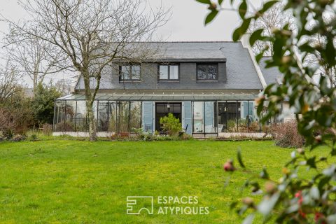 Maison familiale avec jardin d&rsquo;hiver et jardin arboré