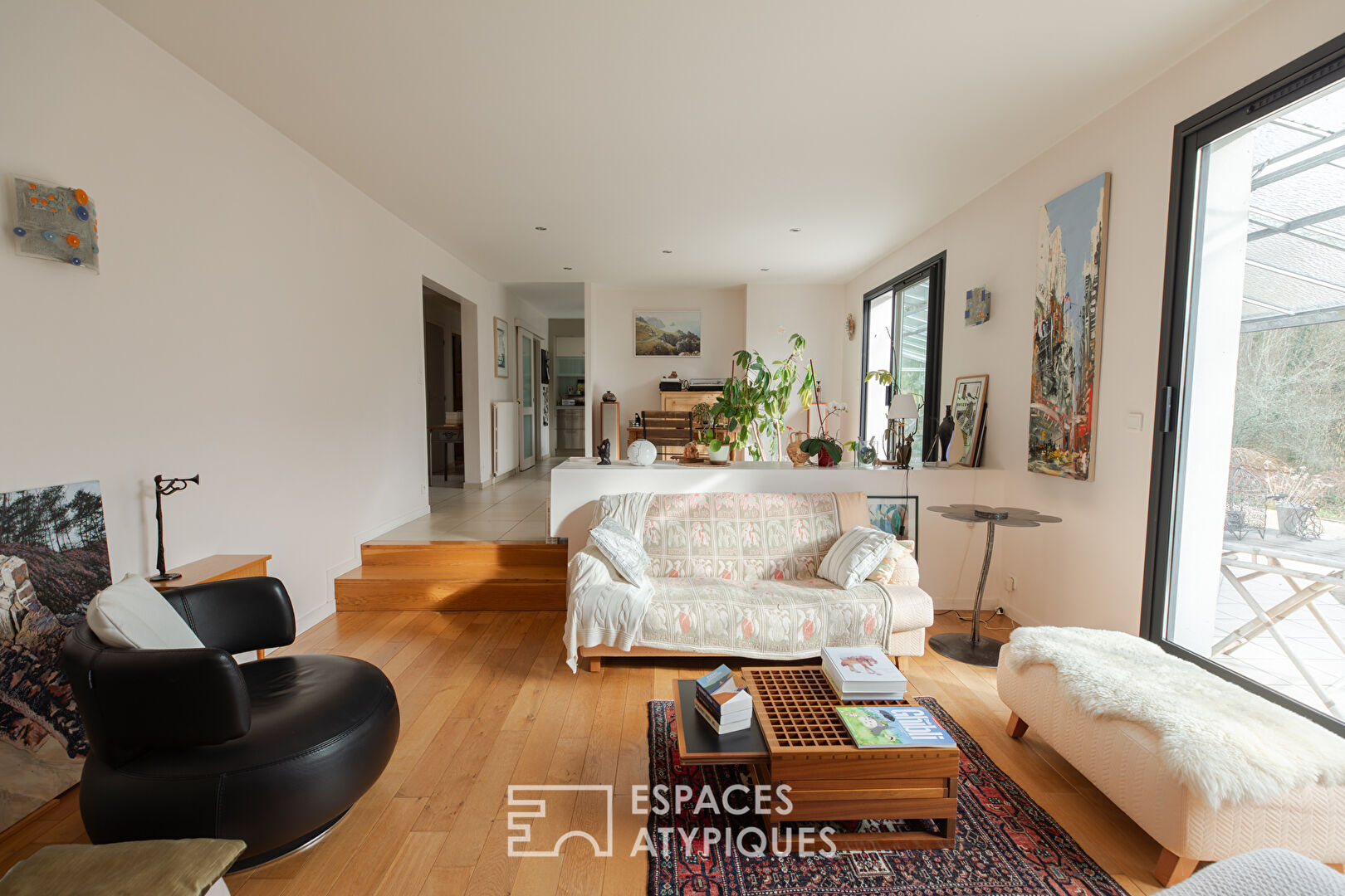 Maison familiale avec jardin d&rsquo;hiver et jardin arboré