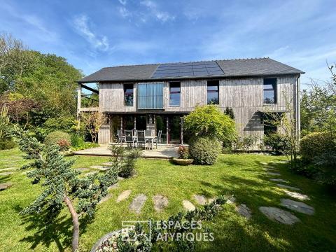 Maison en bois et cottage indépendant au coeur d&rsquo;un jardin paysager
