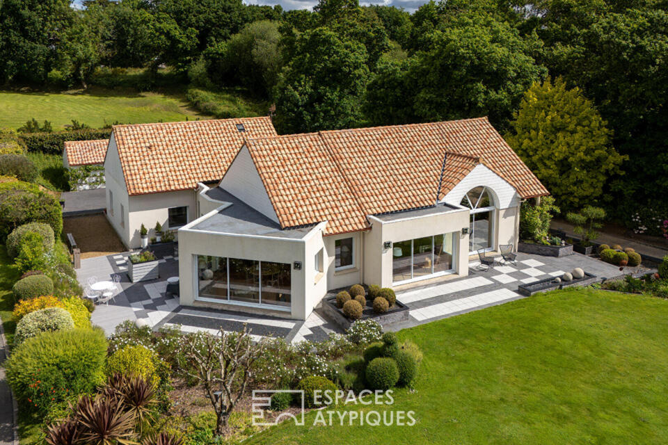 Demeure familiale de plain-pied ouverte sur le jardin