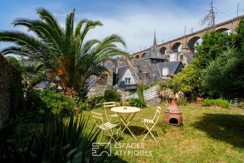 Demeure de caractère avec son jardin secret et ses multiples possibilités