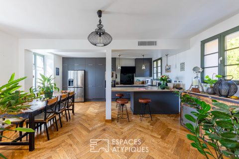 Completely renovated property, its outbuildings, and its wooded park.