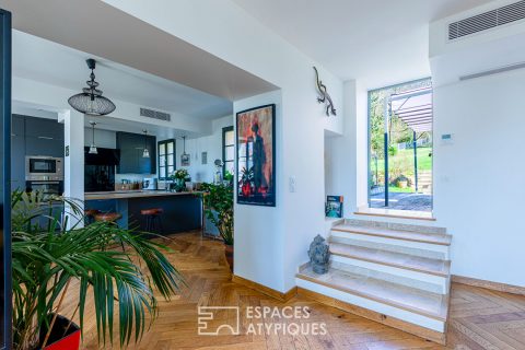 Completely renovated property, its outbuildings, and its wooded park.