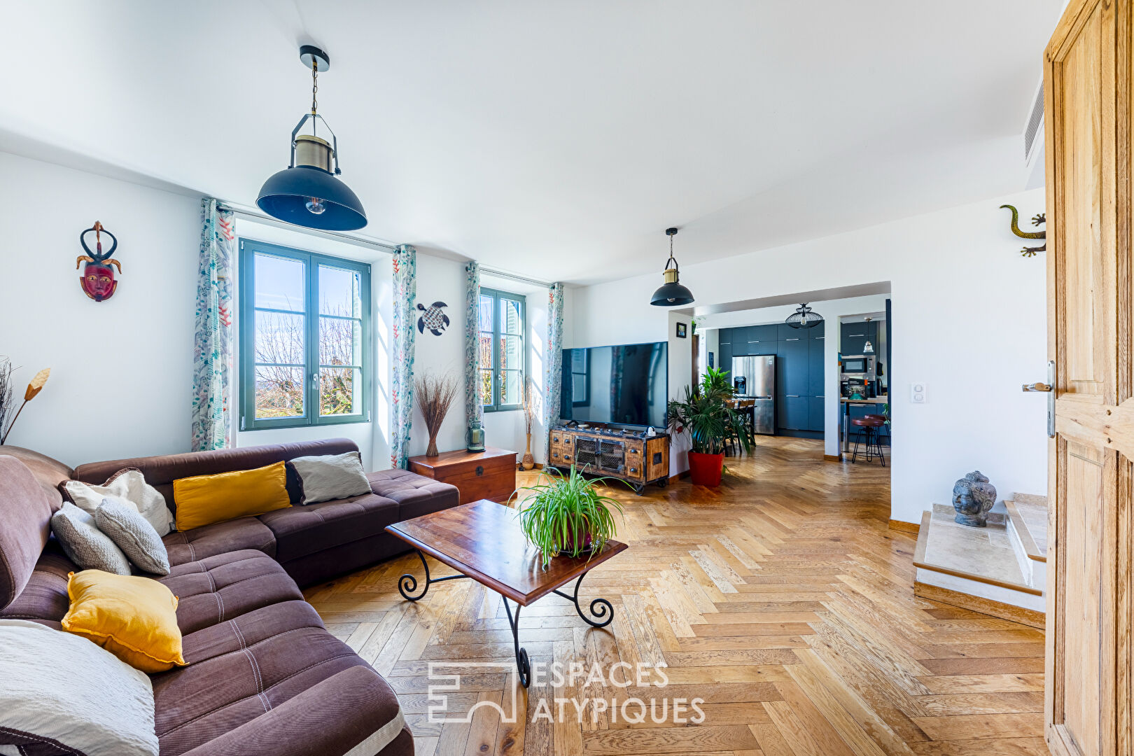 Completely renovated property, its outbuildings, and its wooded park.