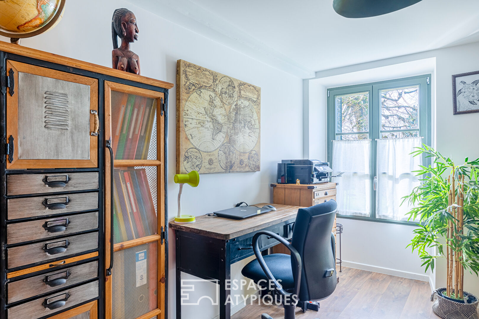 Completely renovated property, its outbuildings, and its wooded park.