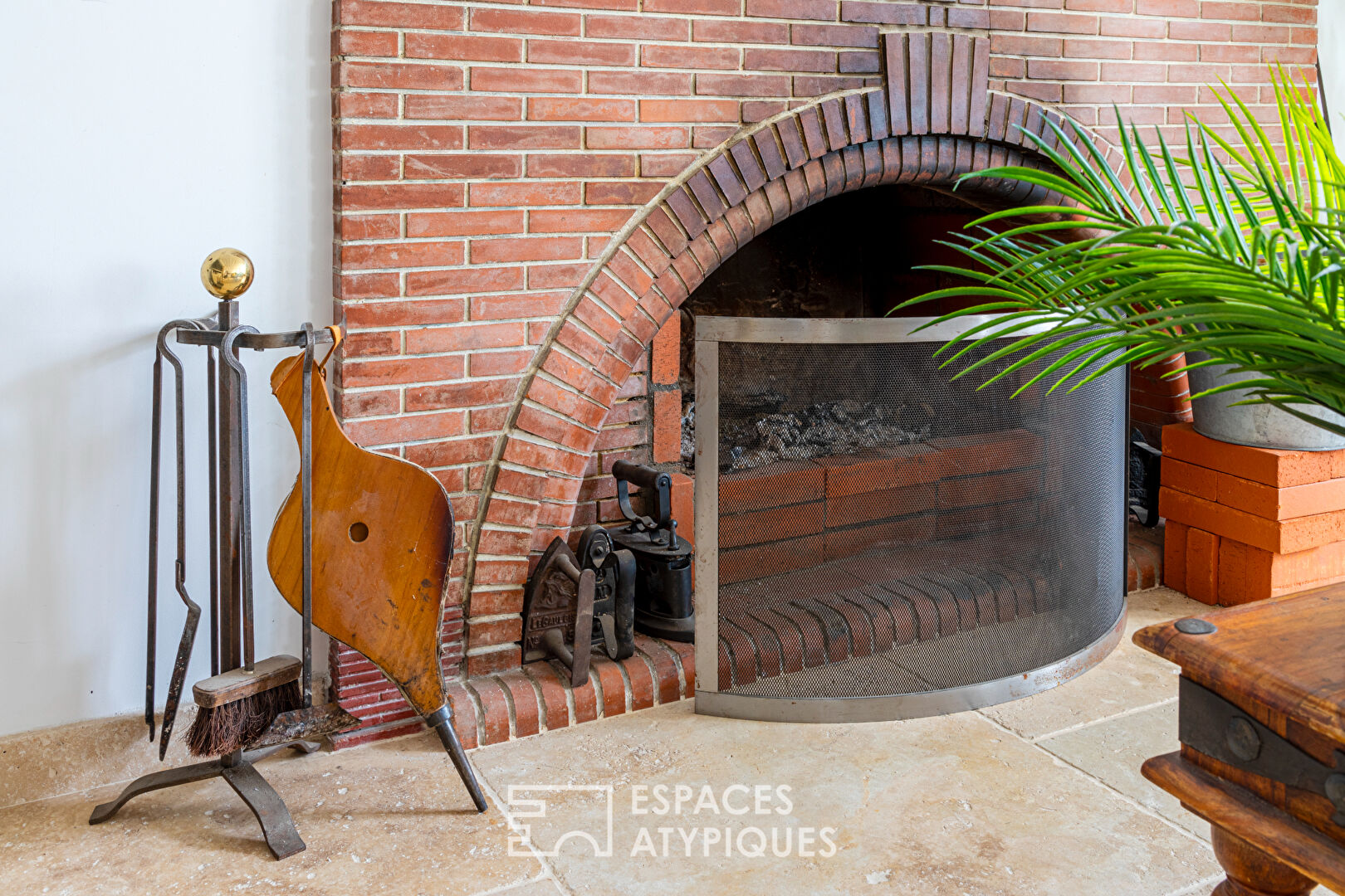 Completely renovated property, its outbuildings, and its wooded park.
