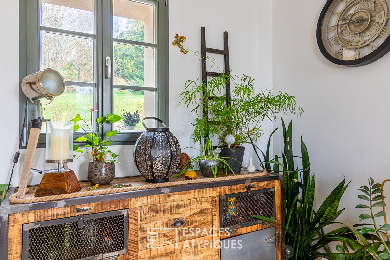 Completely renovated property, its outbuildings, and its wooded park.