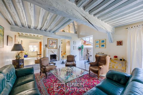 18th century farmhouse renovated into a family home with indoor swimming pool, terrace and garden in Attainville.