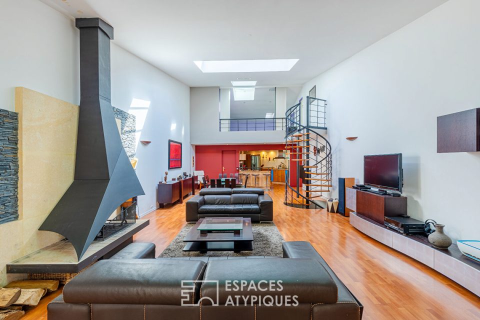 Grand loft sur trois niveaux avec espace bien-être et salle de cinéma
