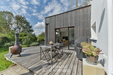 Audacieuse maison revisitée et ses deux appartements ossature bois