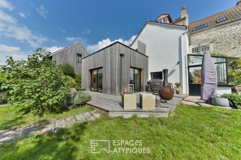 Audacieuse maison revisitée et ses deux appartements ossature bois