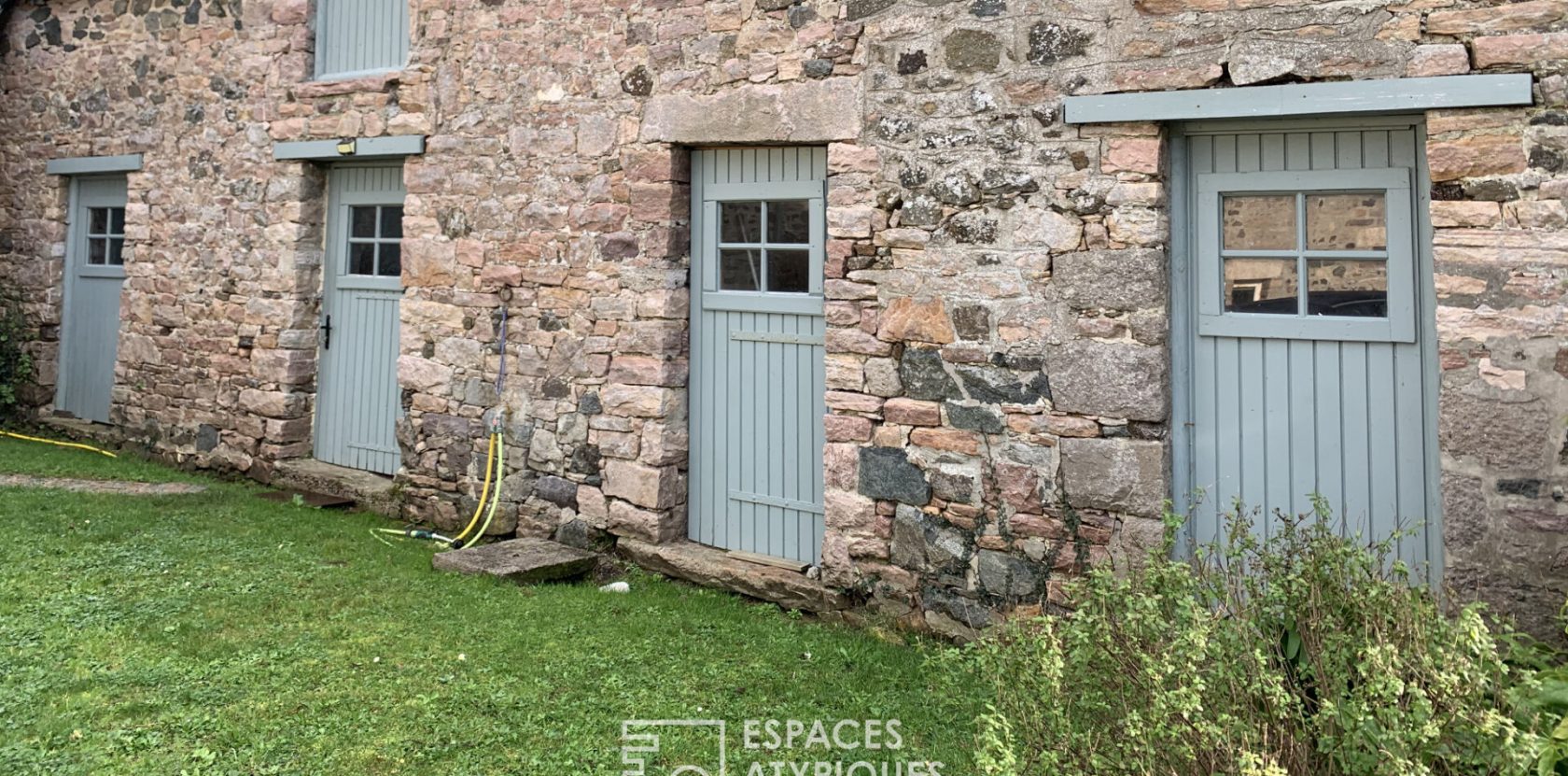 Old farmhouse and its outbuildings