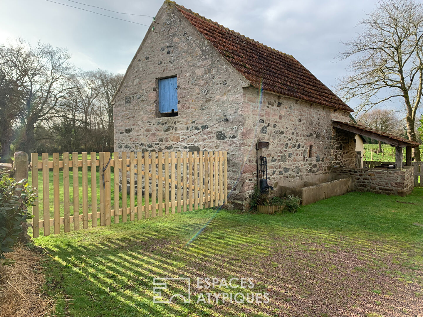 Old farmhouse and its outbuildings