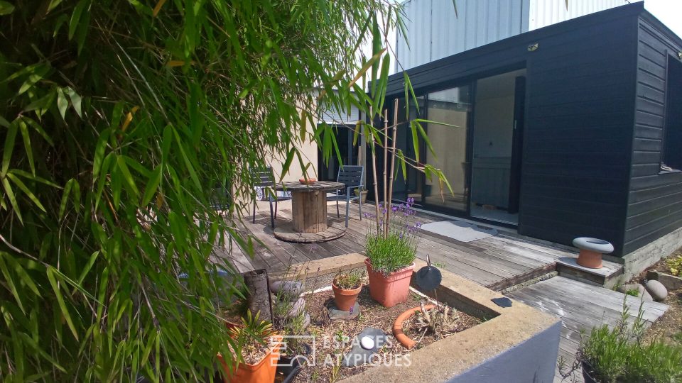 Esprit loft de Plain pied en zone artisanale + atelier