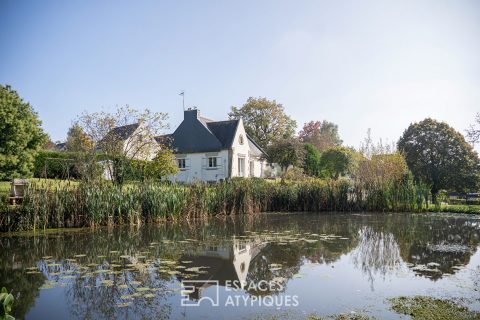 Maison avec son étang, ses cabanons et son terrain constructible