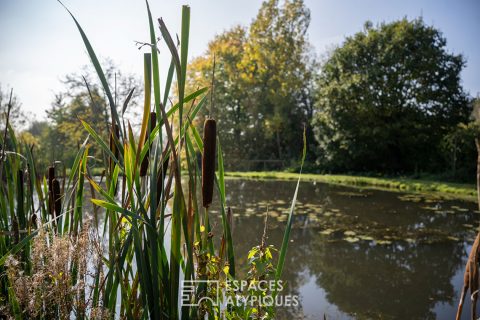Maison avec son étang, ses cabanons et son terrain constructible