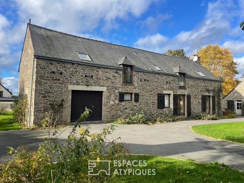 Charming farmhouse, 2 renovated longhouses and its stone outbuilding.