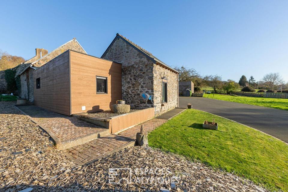 Charmante maison en pierre et son extension bois