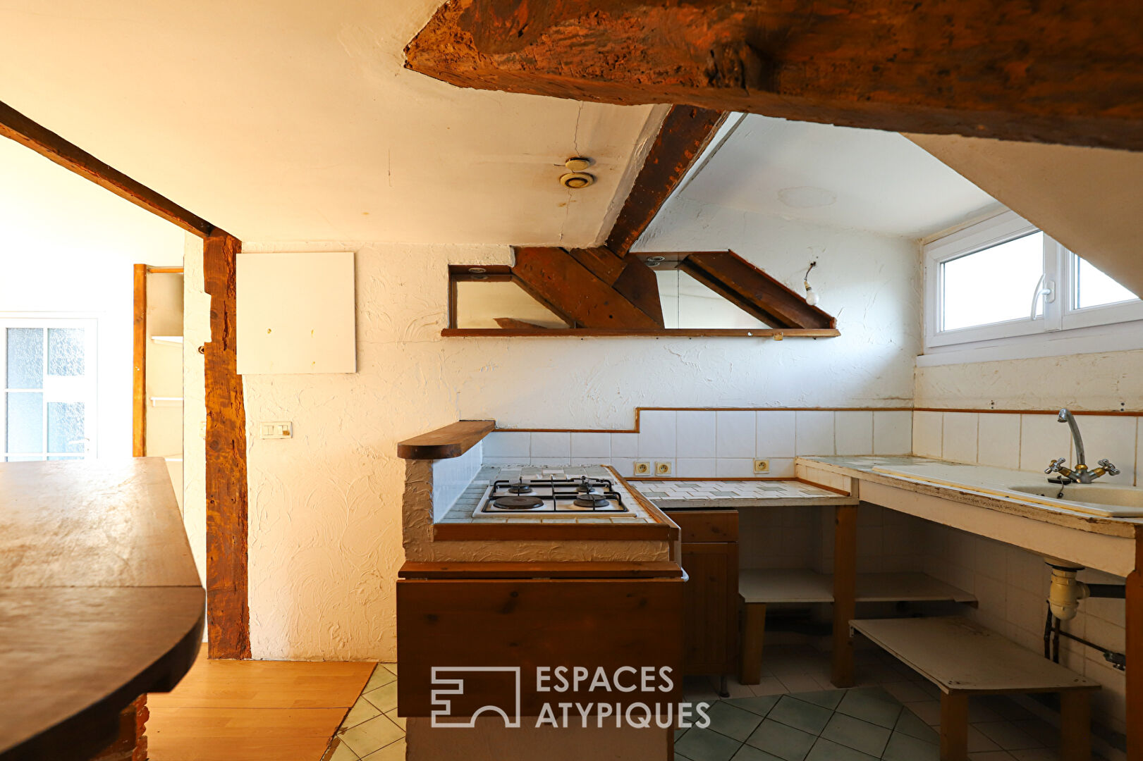 Appartement mansardé à rénover