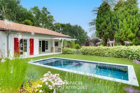 A charming property nestled in lush greenery