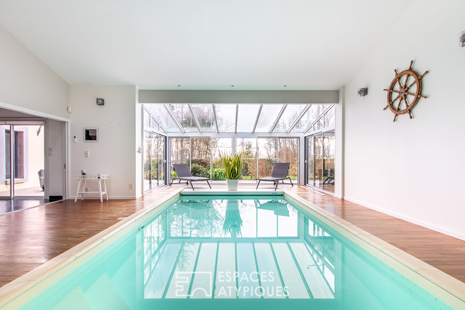 Architect-designed house with indoor pool and forest view