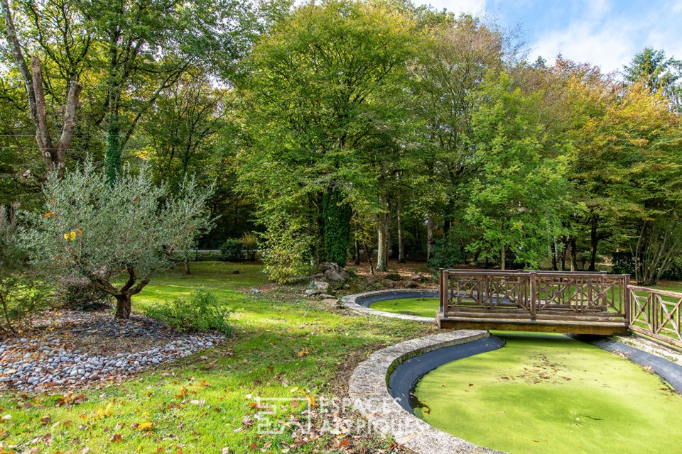 Maison d'architecte avec parc paysager