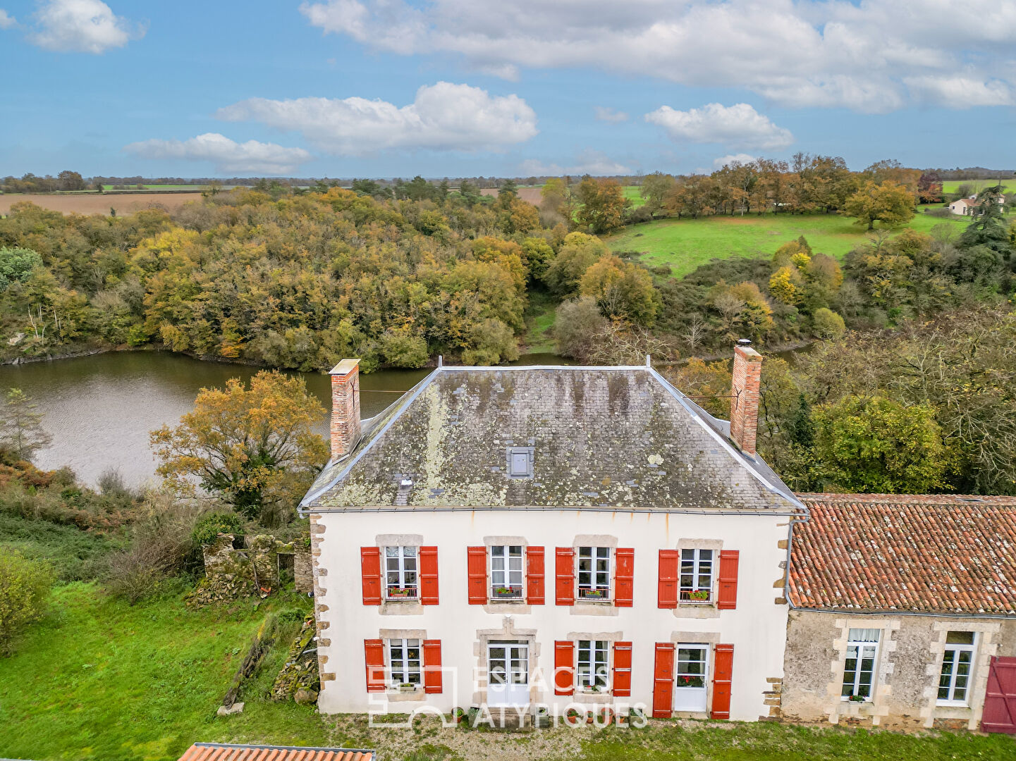 Former school renovated with a view of the river