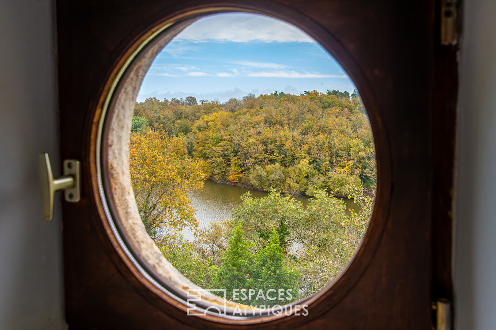 Former school renovated with a view of the river