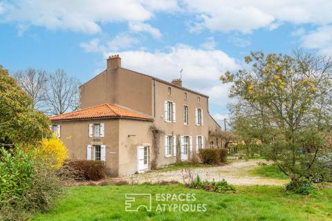 Maison familiale de caractère sur vaste terrain arboré