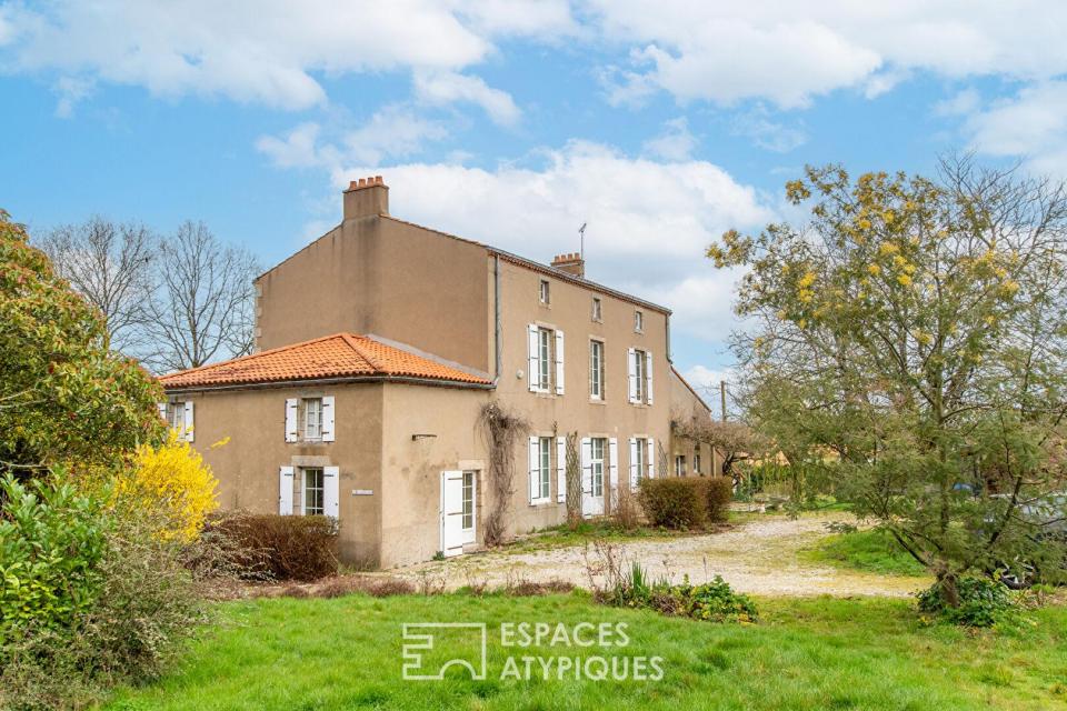 Maison familiale de caractère sur vaste terrain arboré