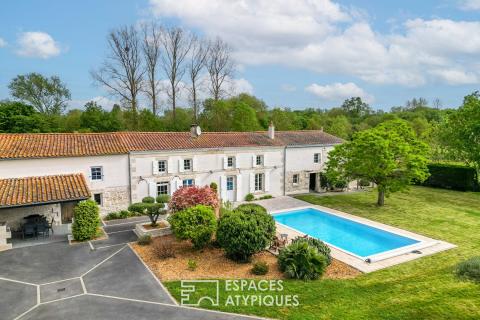 Belle longère de charme avec piscine dans un environnement naturel