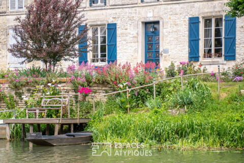 La vie au fil de l’eau: grande maison bourgeoise en coeur de village