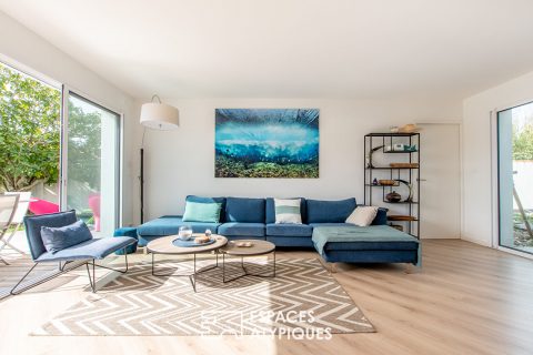 Architect house with terrace and garden by the sea