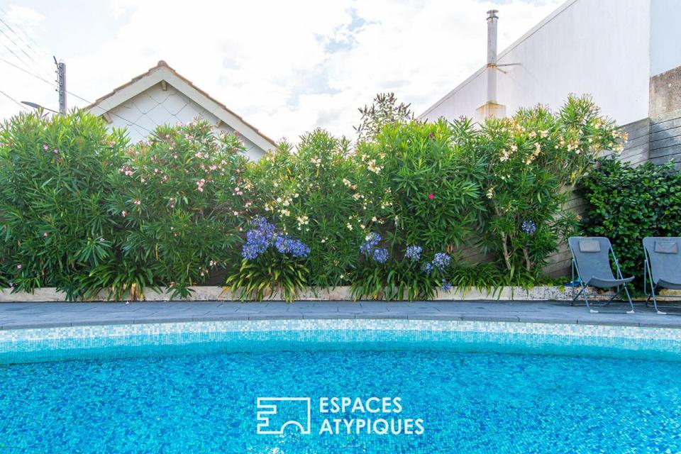 Villa confidentielle avec piscine rooftop et deux garages au coeur d'un quartier prisé