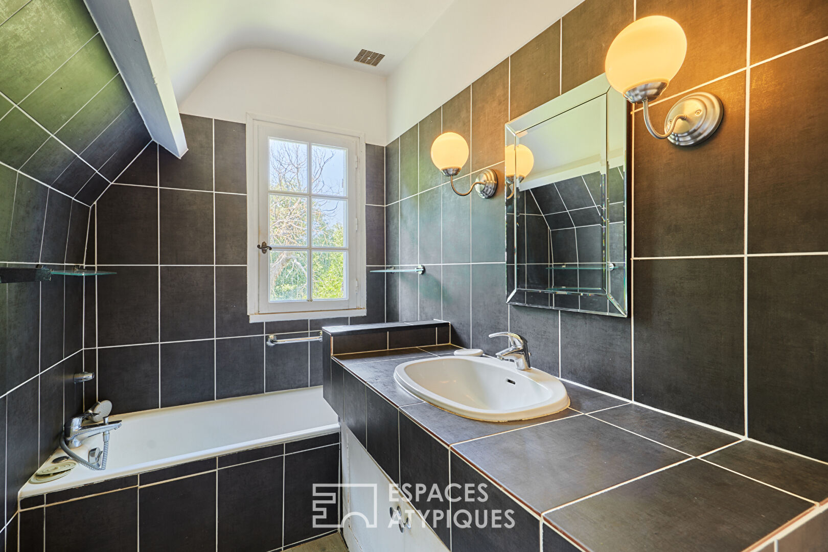 Maison d’inspiration normande et son jardin extraordinaire