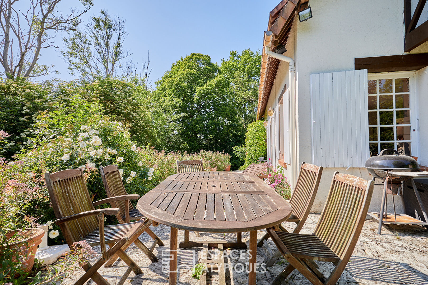 Maison d’inspiration normande et son jardin extraordinaire