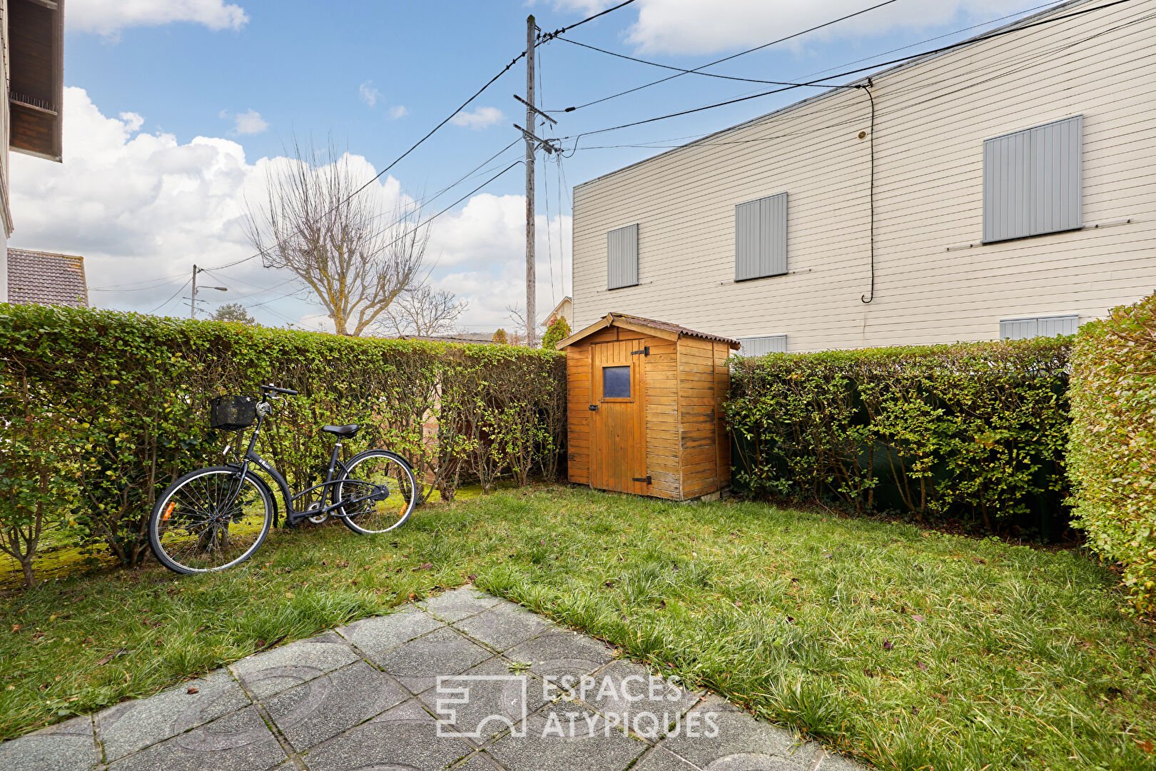 Cottage en triplex avec son jardin