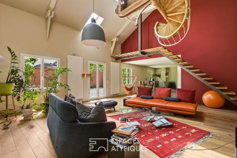 Maison de ville aux volumes remarquables et son jardin