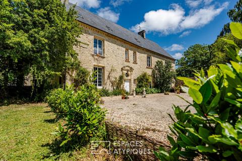 Ancien manoir dans un écrin de verdure