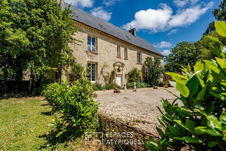 Ancien manoir dans un écrin de verdure