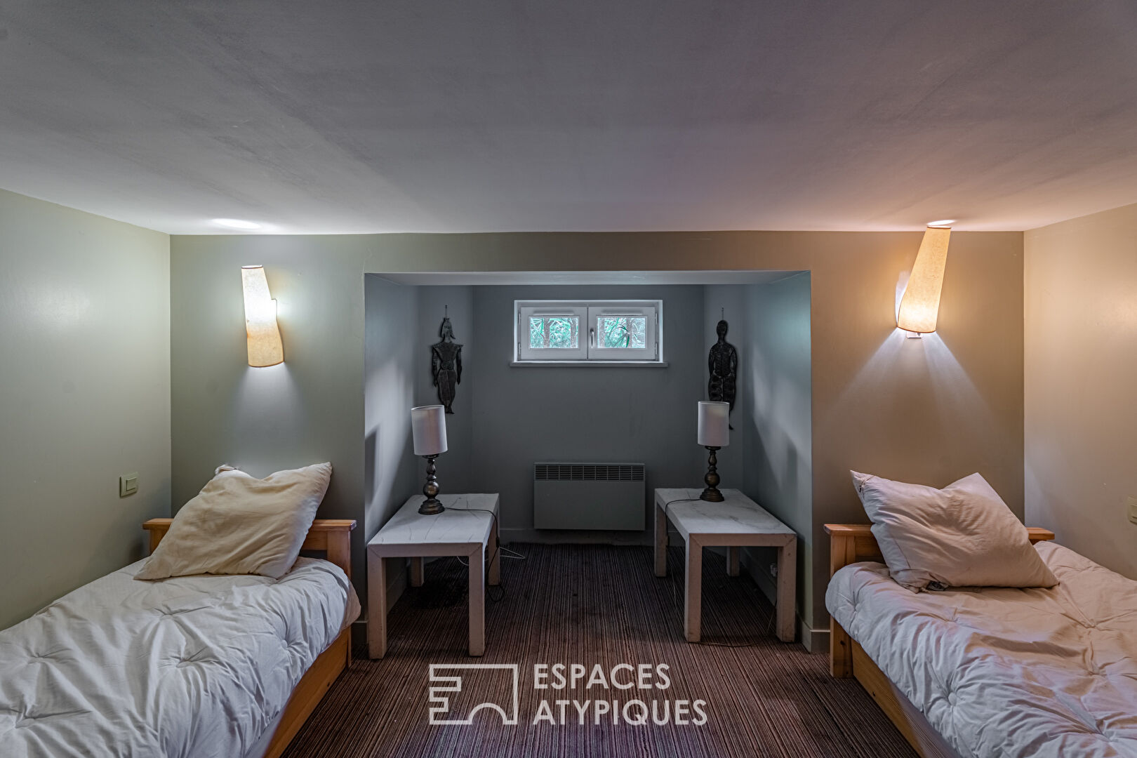 Appartement avec jardin privatif dans villa de caractère