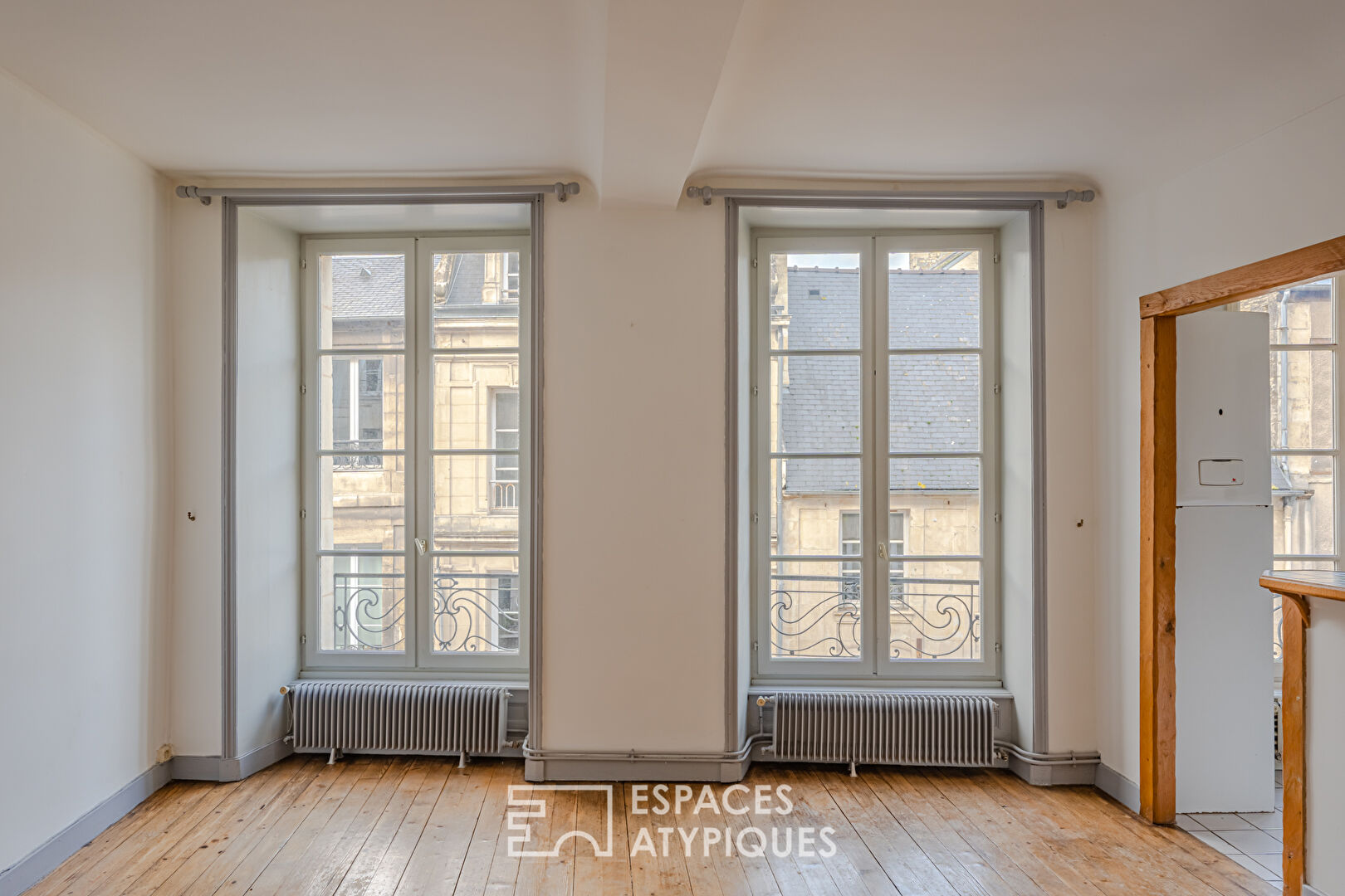 RARE! Dans le centre historique, appartement avec terrasse à réinterpréter