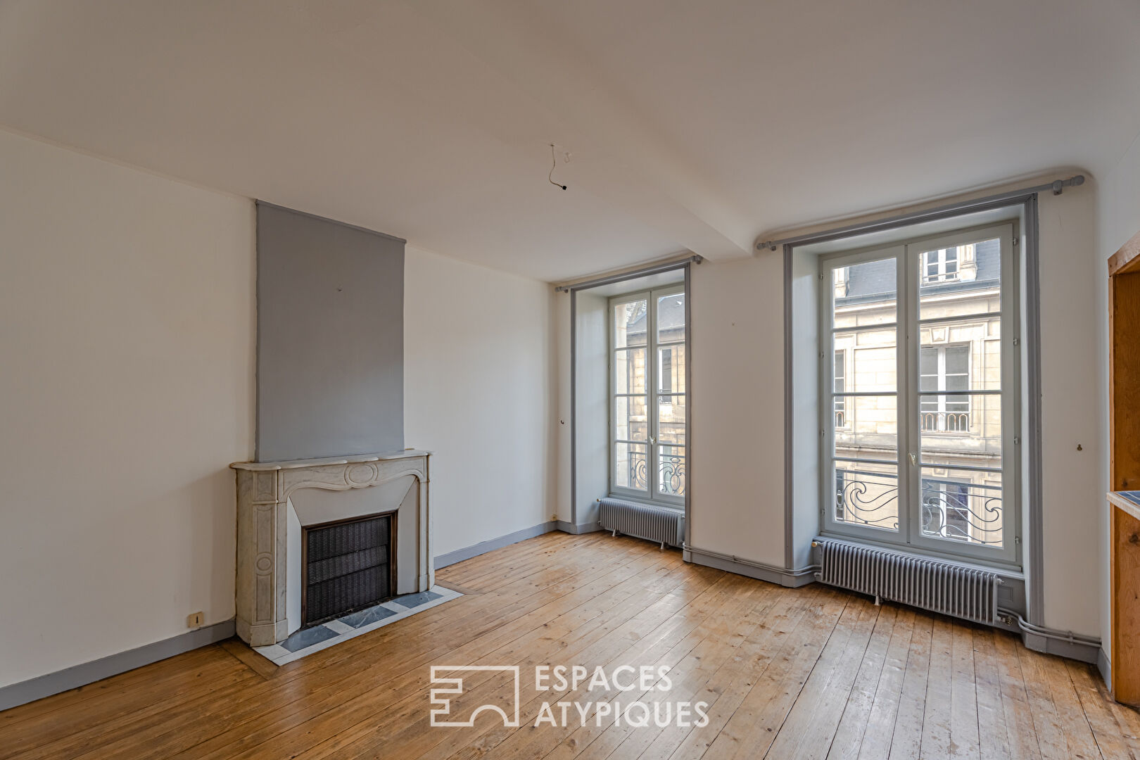 RARE! Dans le centre historique, appartement avec terrasse à réinterpréter