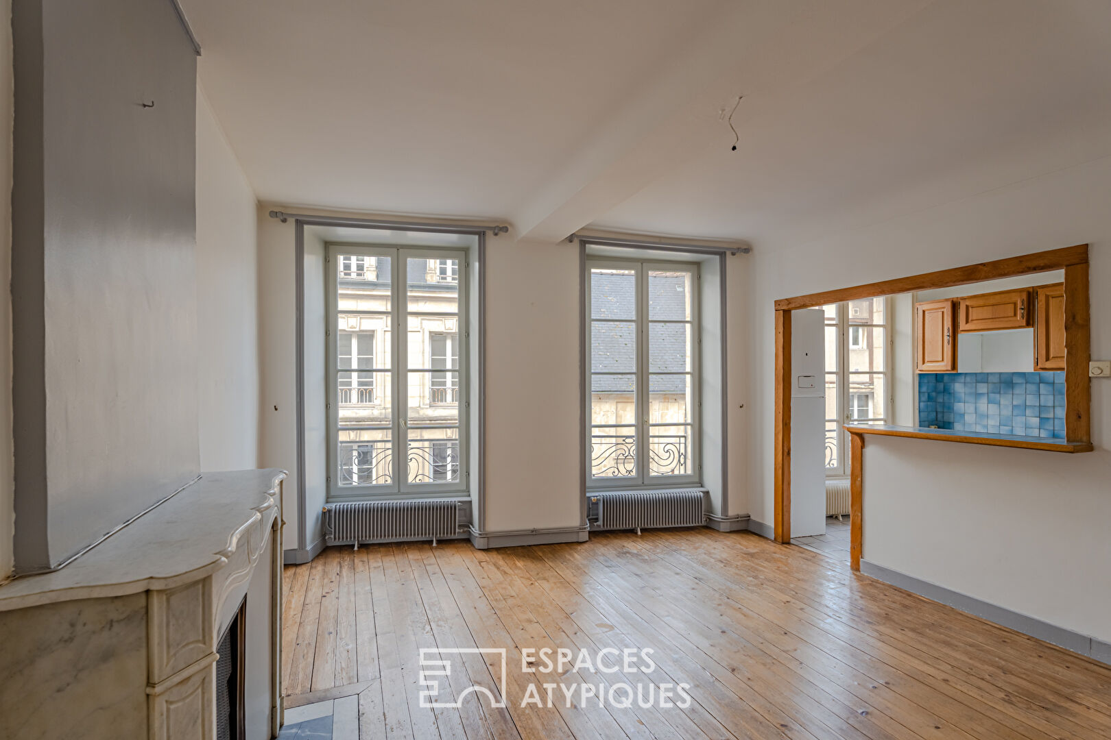 RARE! Dans le centre historique, appartement avec terrasse à réinterpréter