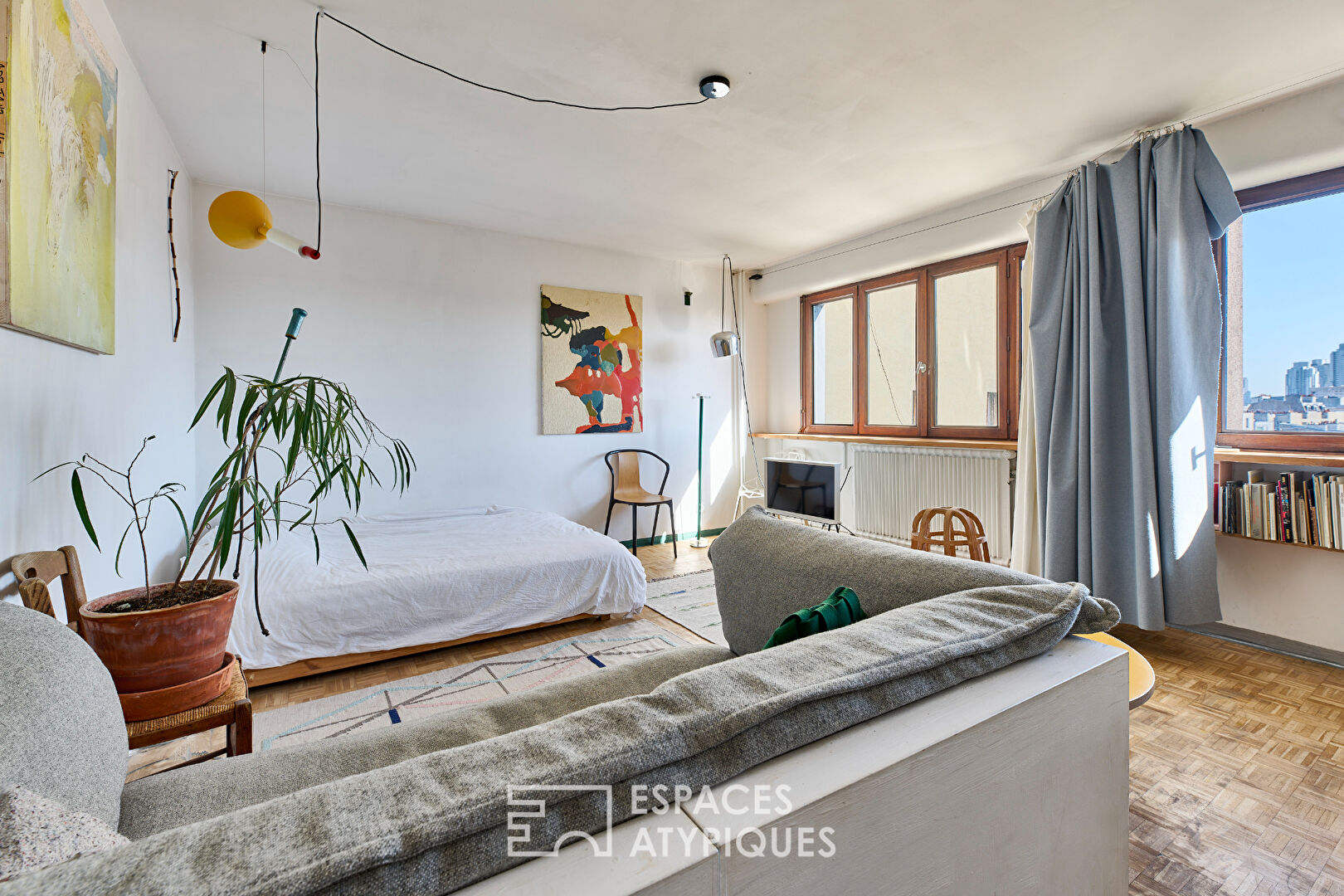 Appartement d’artiste en étage élevé sans vis-à-vis