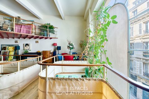 Ancien studio de danse transformé par un architecte en loft familial proche Martyrs